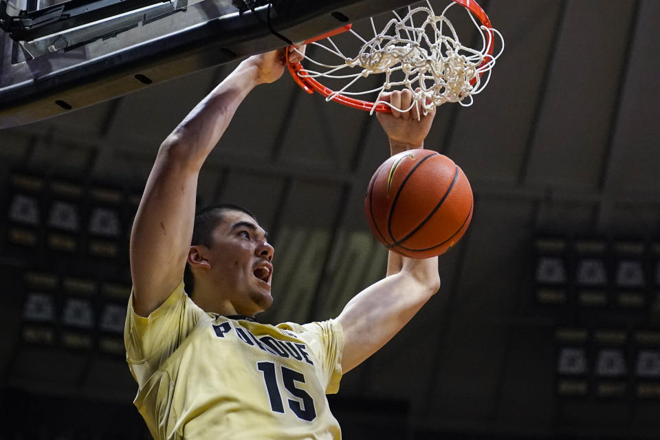 Purdue center Zach Edey (15) gets a dunk against Florida State during the second half of an NCAA college basketball game in West Lafayette, Ind., Tuesday, Nov. 30, 2021. Purdue defeated Florida State 93-65. (AP Photo/Michael Conroy)