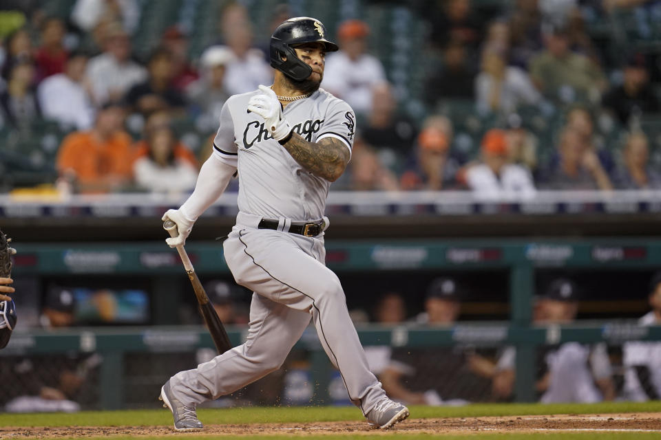 Chicago White Sox's Yoan Moncada grounds into a force out that scored Brian Goodwin against the Detroit Tigers in the third inning of a baseball game in Detroit, Monday, Sept. 20, 2021. (AP Photo/Paul Sancya)