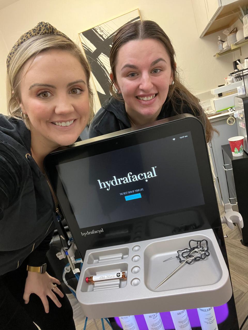 Meghan Hanna (left) and Jenna Hester (right) pose with their HydraFacial machine at Prim Aesthetics at 225 Ashmun St. in Sault Ste. Marie, which they will be able to pay off using a $25,000 grant from the Michigan Economic Development Corporation’s Match on Main grant program.