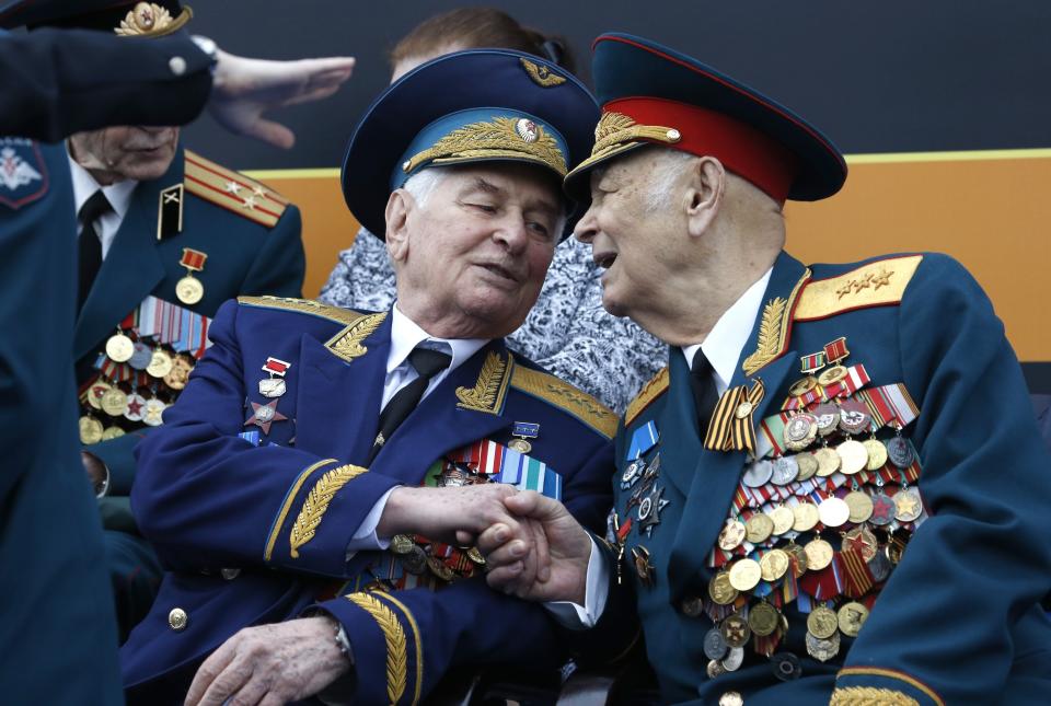 Russian WWII veterans wait for the Victory Day military parade to celebrate 74 years since the victory in WWII in Red Square in Moscow, Russia, Thursday, May 9, 2019. (AP Photo/Alexander Zemlianichenko)