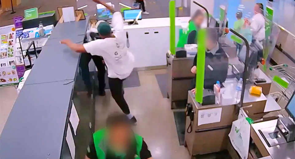 A Woolworths staffer being kicked. 