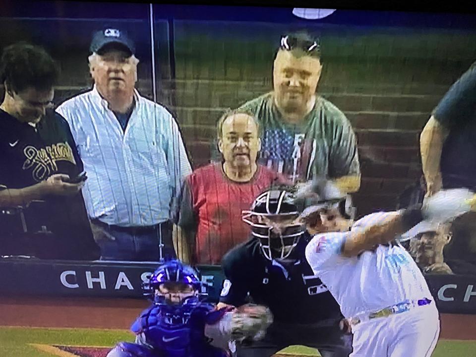 In an image taken from a television screen, Arizona Supreme Court Justice Clint Bolick is shown seated in the batter's box suite on Oct. 11, 2023, watching the Arizona Diamondbacks play the Los Angeles Dodgers in a divisional series.