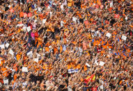 Fans cheer during the drivers parade before the Formula One Dutch Grand Prix, at the Zandvoort racetrack, Netherlands, Sunday, Sept. 5, 2021. (AP Photo/Peter Dejong)