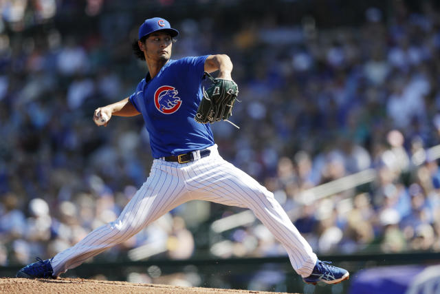 Chicago Cubs starting pitcher Yu Darvish works against a Milwaukee Brewers  batter during the first inning of a spring training baseball game Saturday,  Feb. 29, 2020, in Mesa, Ariz. (AP Photo/Gregory Bull