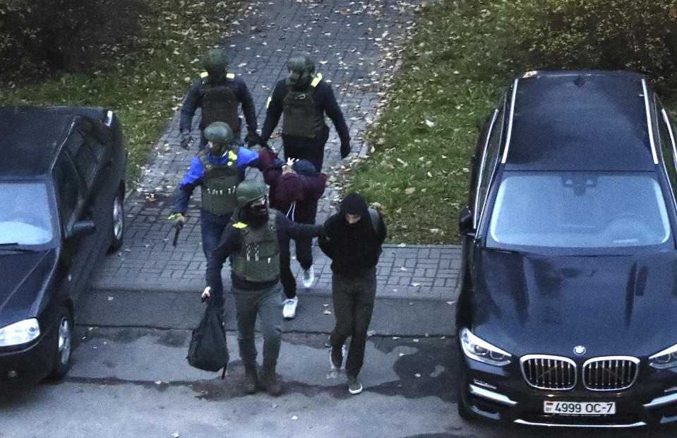 Police detain protesters after dispersing an opposition rally to protest the official presidential election results in Minsk, Belarus, Sunday, Oct. 25, 2020. (AP Photo)