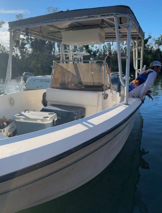 Multiple law enforcement agencies are searching the Gulf of Mexico for four men who did not return from a boating trip Saturday in this 23-foot SportCraft boat.