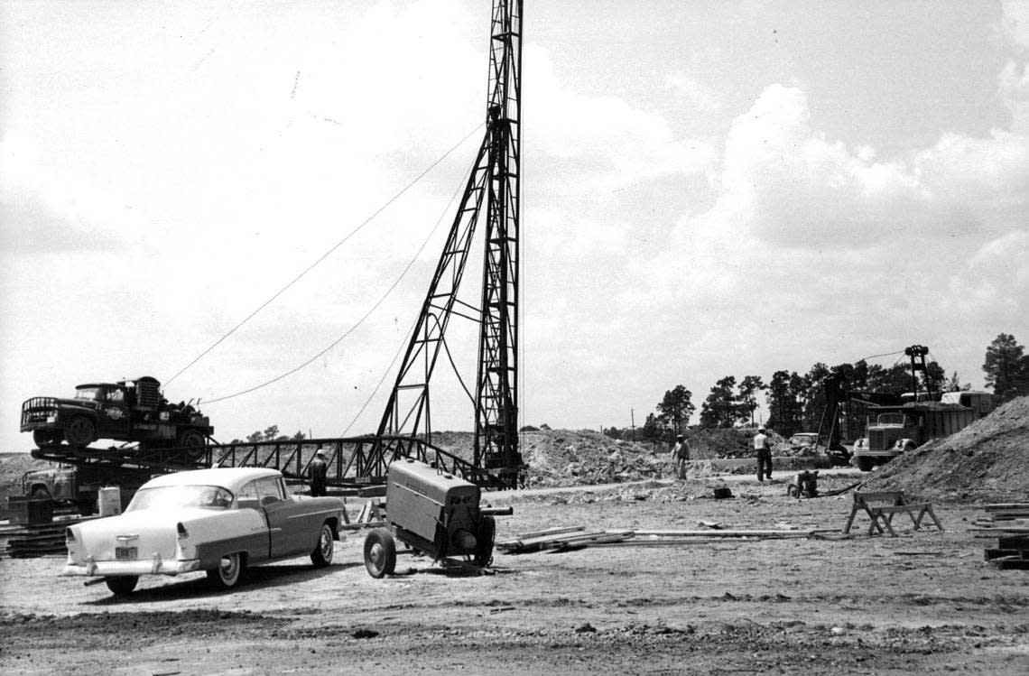 Action in 1960 at the southern end of the Palmetto Expressway as piles go down for a crossing at North Kendall Drive.