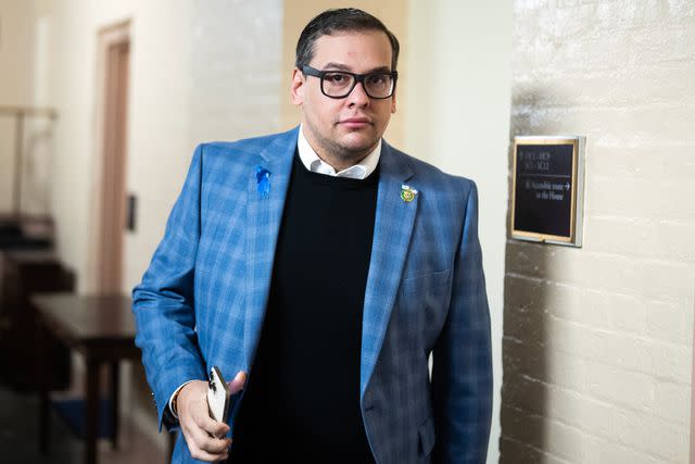 <p>Tom Williams/CQ-Roll Call, Inc via Getty</p> George Santos leaving a meeting of the House Republican Conference in the U.S. Capitol on Tuesday, November 7, 2023