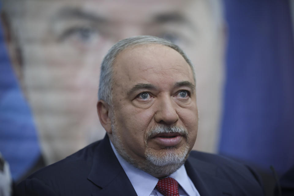 FILE - In this May 30, 2019 file photo, Former Israeli Defense Minister and Yisrael Beiteinu party leader Avigdor Lieberman speaks to journalists during a press conference in Tel Aviv, Israel. Israel finds itself in a familiar place after a tumultuous election campaign, with Lieberman seemingly in control of the country’s fate. Opinion polls ahead of the March 2 vote show that neither Prime Minister Benjamin Netanyahu nor his challenger Benny Gantz will be able to form a coalition government without him. Lieberman remains cagey about his intentions, raising the possibility his brinkmanship could end up forcing yet another election. (AP Photo/Oded Balilty, File)