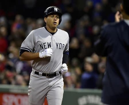 May 1, 2015; Boston, MA, USA; New York Yankees pinch hitter Alex Rodriguez (13) heads to the dugout after hitting a home run tying Willie Mays record for most home runs during the eighth inning against the Boston Red Sox at Fenway Park. Mandatory Credit: Bob DeChiara-USA TODAY Sports