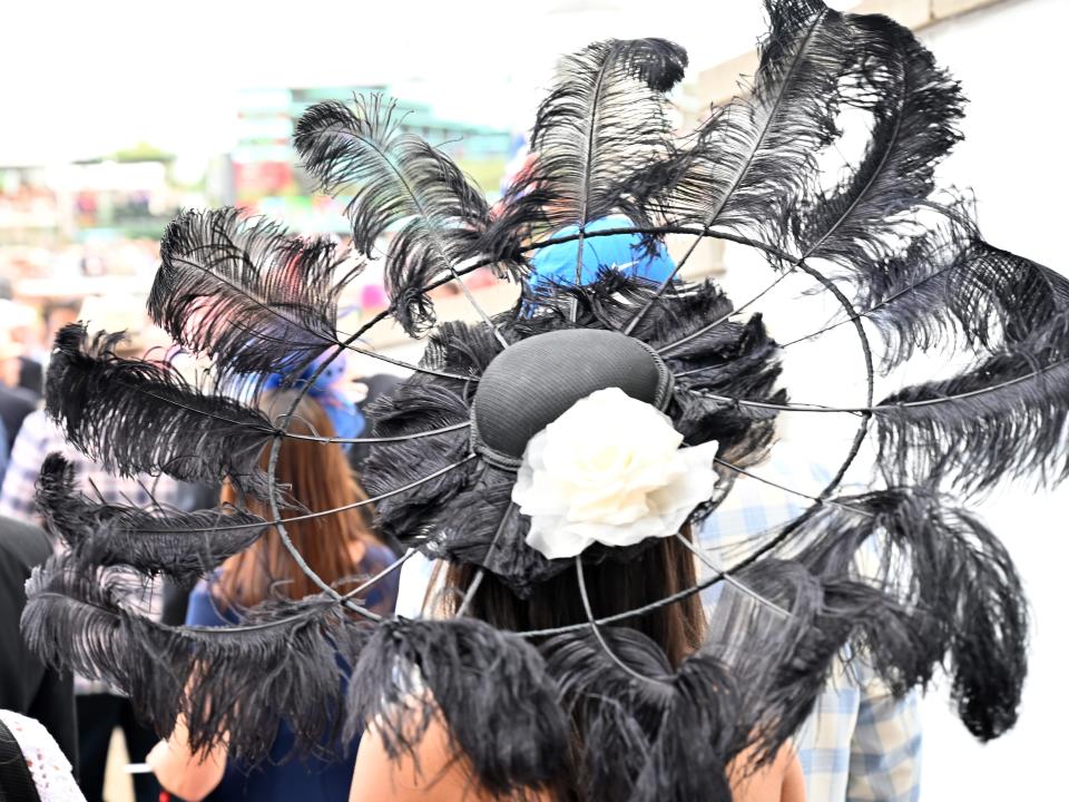 A black, feathery hat at the 2023 Kentucky Derby.