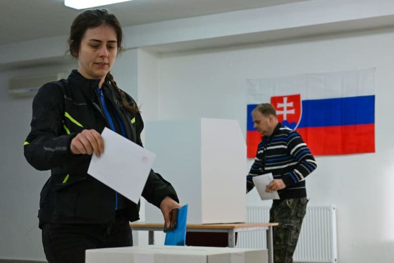 Voters cast their ballots at a polling station in 2024 Slovakia presidential election run-off. álek Václav/CTK/dpa