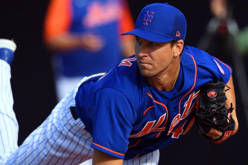 New York Mets pitcher Jacob deGrom warms up his arm on Monday, March 14, 2022, as players return to Clover Park in Port St. Lucie for spring training practice.