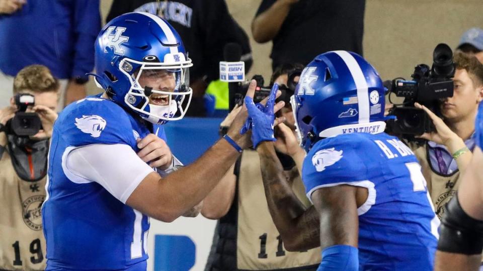 Kentucky quarterback Devin Leary, left, celebrates a touchdown throw with wide receiver Barion Brown during a game earlier this season. Leary said he is looking forward to finally having a chance to play in a bowl game.