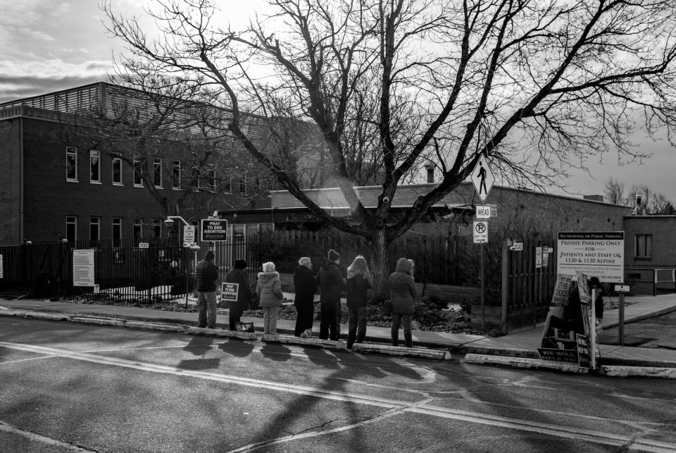 Antiabortion protesters pray in front of Dr. Warren Hern's abortion clinic Feb. 1 in Boulder, Colo.