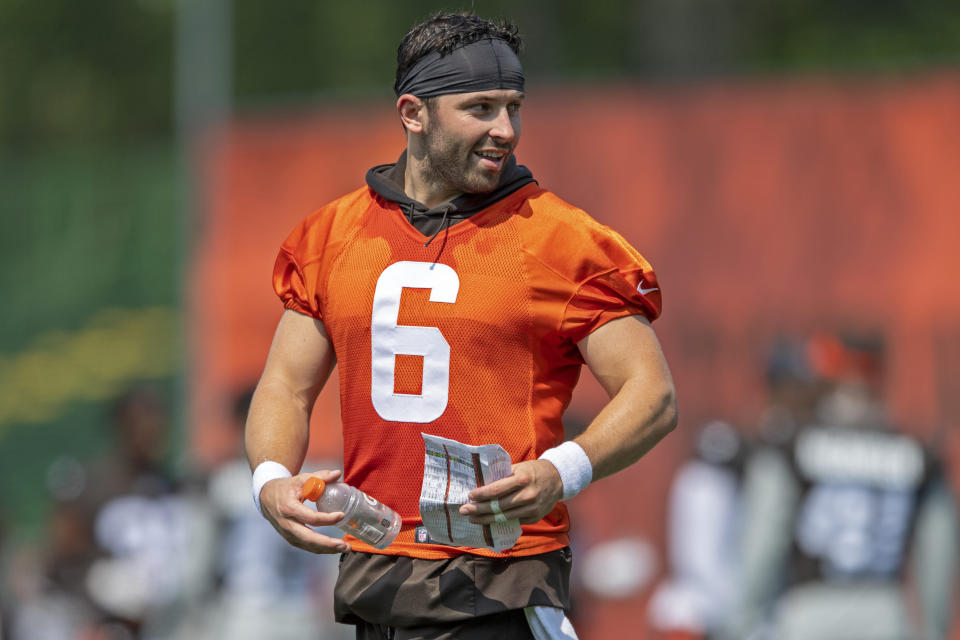 Cleveland Browns quarterback Baker Mayfield (6) smiles while talking during NFL football practice in Berea, Ohio, Wednesday, July 28, 2021. (AP Photo/David Dermer)