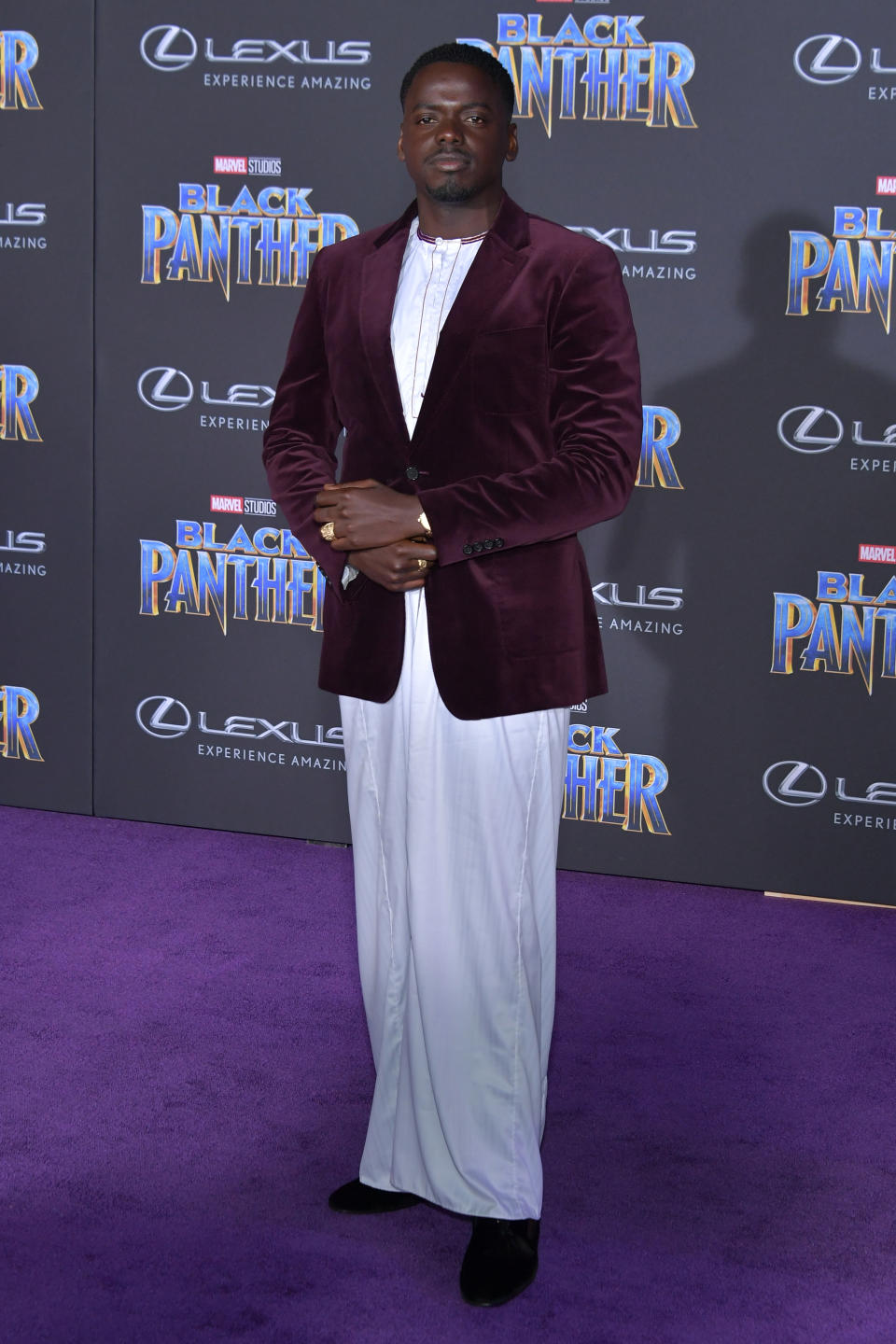 <p>Kaluyya, who plays W’Kabi in the film, dresses in long linen robe worn beneath a burgundy velvet blazer. <em>[Photo: Getty]</em> </p>