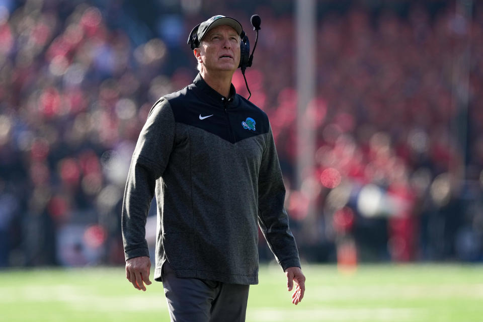 CINCINNATI, OHIO - NOVEMBER 25: Head coach Willie Fritz of the Tulane Green Wave looks on in the first quarter against the Cincinnati Bearcats at Nippert Stadium on November 25, 2022 in Cincinnati, Ohio. (Photo by Dylan Buell/Getty Images)