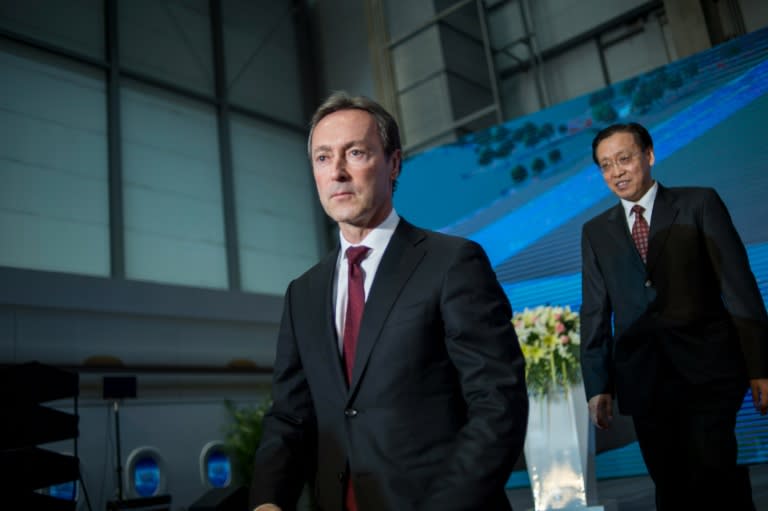 Airbus President and CEO Fabrice Bregier (L) and China's National Development and Reform Commission Vice-Minister Lin Nianxiu attend a ceremony to mark the beginning of construction on a new Airbus facility in Tianjin, on March 2, 2016