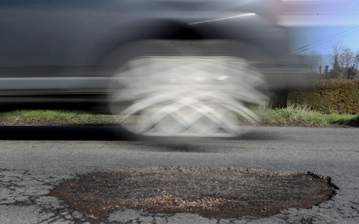 Potholes are a major hazard for drivers in Rome  - PA