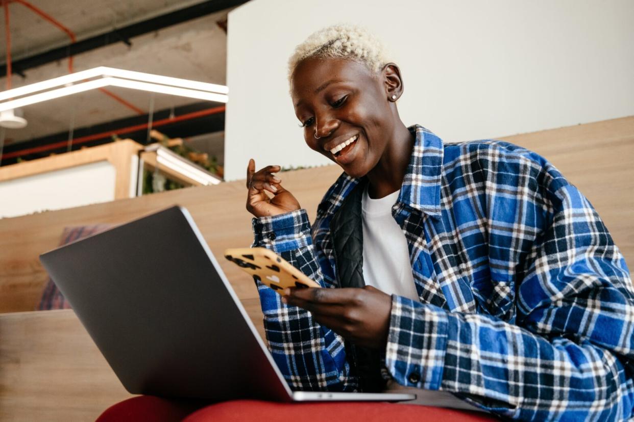 Woman on Phone and Computer