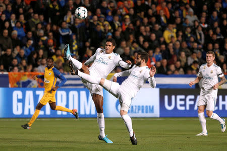 Soccer Football - Champions League - APOEL Nicosia vs Real Madrid - GSP Stadium, Nicosia, Cyprus - November 21, 2017 Real Madrid’s Raphael Varane and Nacho in action REUTERS/Alkis Konstantinidis