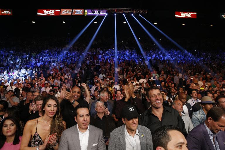 Members of the crowd await the start of the Floyd Mayweather vs Manny Pacquiao welterweight unification fight on May 2, 2015 at the MGM Grand Garden Arena