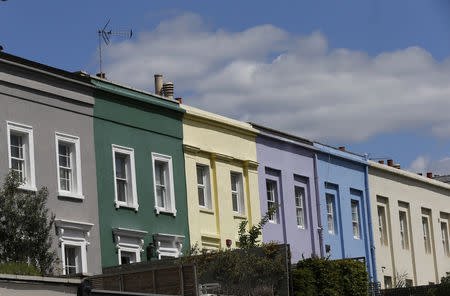 FILE PHOTO: A row of houses are seen in London, Britain June 3, 2015. REUTERS/Suzanne Plunkett