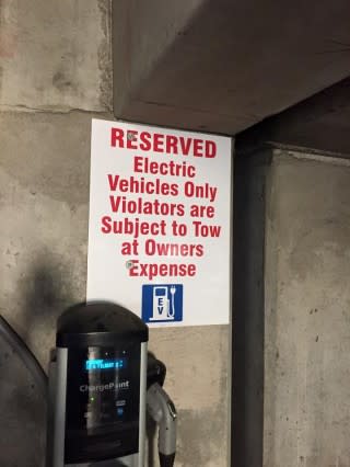 Electric Vehicle Only parking sign, Philadelphia public garage [photo: Jim Burness]