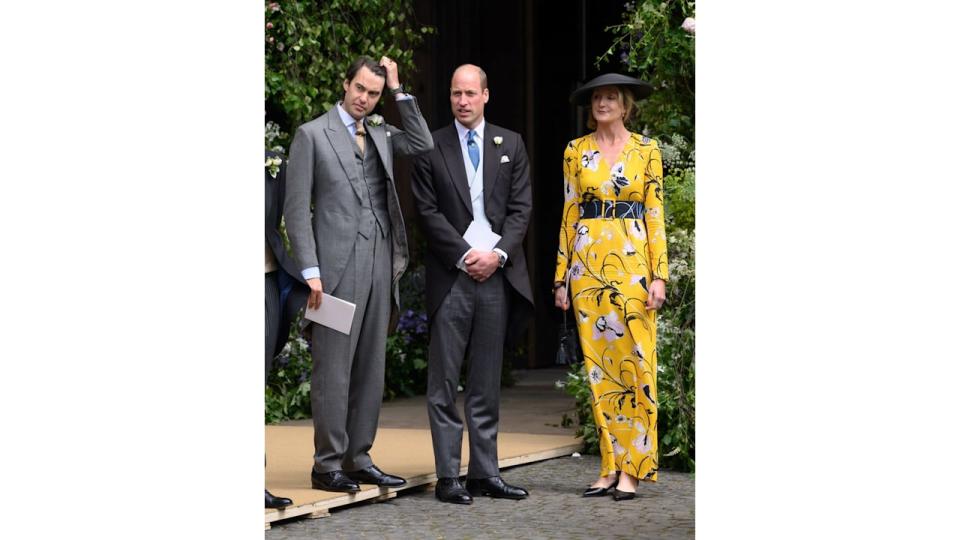 Prince William stands between William van Cutsem and Rosie van Cutsem as they depart after attending the wedding of The Duke of Westminster and Olivia Grosvenor