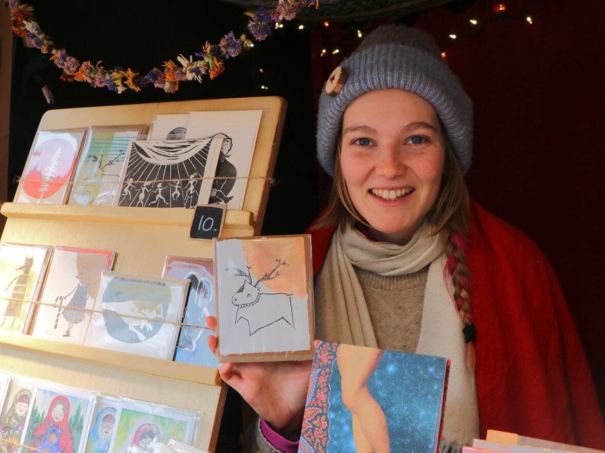 Pascal e. is one of the dozens of merchants selling product in the coveted booths at the 15th edition of Quebec City's German Christmas Market.  (Rachel Watts/CBC - image credit)