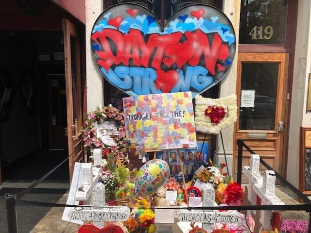 A makeshift memorial sits outside Ned Peppers nightclub in the Oregon District entertainment neighborhood where on Aug. 4 a gunman killed nine people, on Wednesday, Aug. 14, 2019, in Dayton Ohio(AP Photo/Dan Sewell)