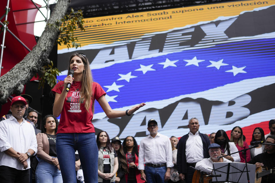 Camilla Fabri, wife of Colombian businessman Alex Saab, speaks during a demonstration demanding his release, in Caracas, Venezuela, Friday, Dec. 16, 2022. For more than two years, almost since the time of his arrest on U.S. warrant, Saab has insisted he is a Venezuelan diplomat targeted for his work helping the South American country circumvent American economic sanctions. (AP Photo/Matias Delacroix)