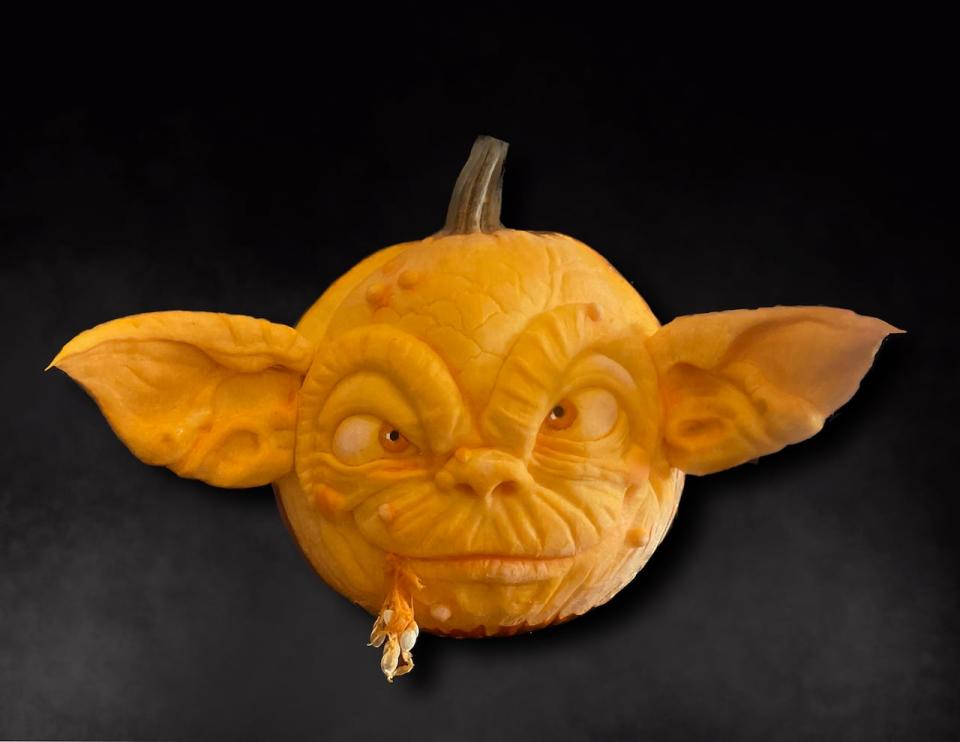 Margi Laurin uses her imagination to come up with spooky yet cute pumpkin carvings.