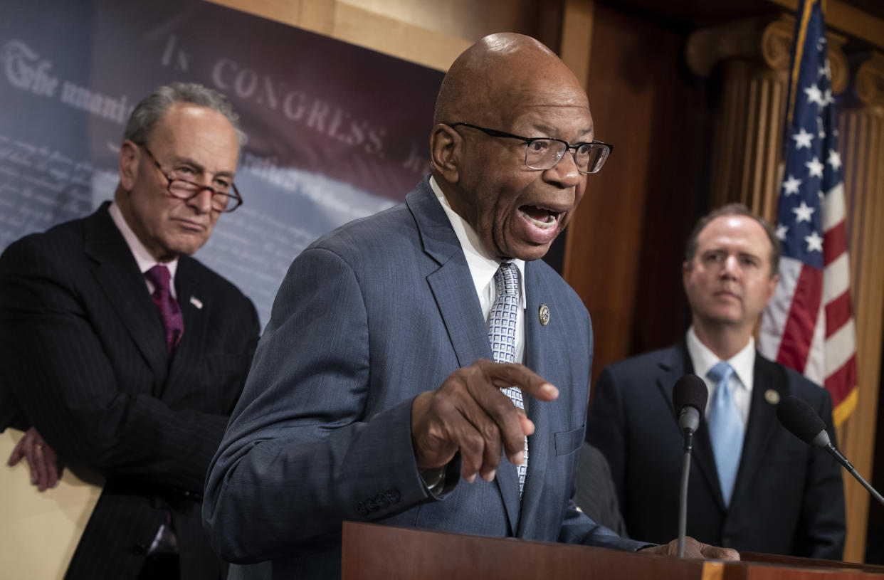 Rep. Elijah Cummings, ranking member of the Committee on Oversight and Government Reform — flanked by Senate Minority Leader Chuck Schumer, D-N.Y., left, and Rep. Adam Schiff of the House Intelligence Committee — responds to the Justice Department’s internal review of the FBI’s handling of the Hillary Clinton email investigation on Capitol Hill in Washington last June. (Photo: J. Scott Applewhite/AP)