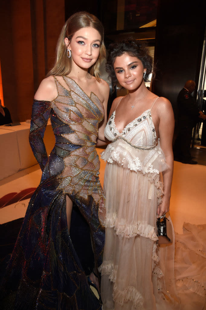 Gigi Hadid (L) and Selena Gomez attend the Heavenly Bodies: Fashion & The Catholic Imagination Costume Institute Gala