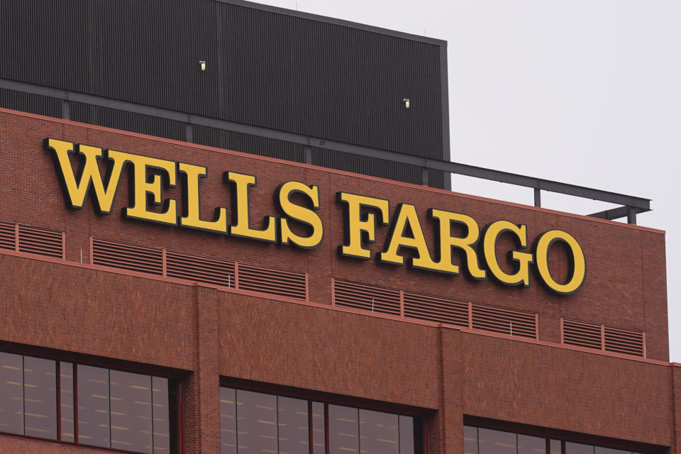 This Tuesday, Oct. 12, 2021 photo shows a Wells Fargo location in Philadelphia. Wells Fargo topped Wall Street expectations for the third quarter, Thursday, Oct. 14. Wells Fargo said earnings rose 59% to $5.12 billion, or $1.17 per share in the third quarter. (AP Photo/Matt Rourke)