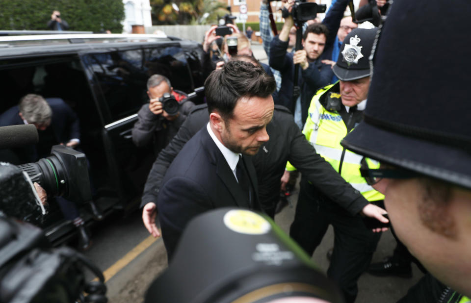 TV presenter Anthony McPartlin (centre) arrives at The Court House in Wimbledon, London to face charges of drink driving. (PA)