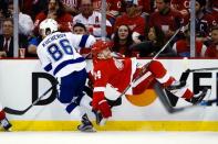 Apr 19, 2016; Detroit, MI, USA; Tampa Bay Lightning right wing Nikita Kucherov (86) checks Detroit Red Wings center Gustav Nyquist (14) during the second period in game four of the first round of the 2016 Stanley Cup Playoffs at Joe Louis Arena. Mandatory Credit: Rick Osentoski-USA TODAY Sports