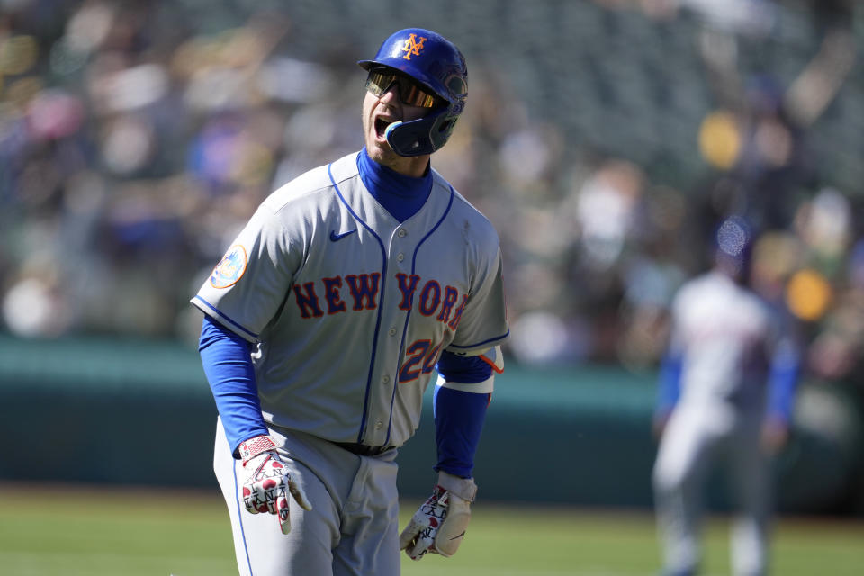 New York Mets' Pete Alonso reacts after hitting a home run during the ninth inning of a baseball game against the Oakland Athletics in Oakland, Calif., Sunday, April 16, 2023. (AP Photo/Jeff Chiu)