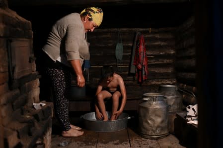 The Wider Image: Russian village's last teacher stays on for her one remaining pupil