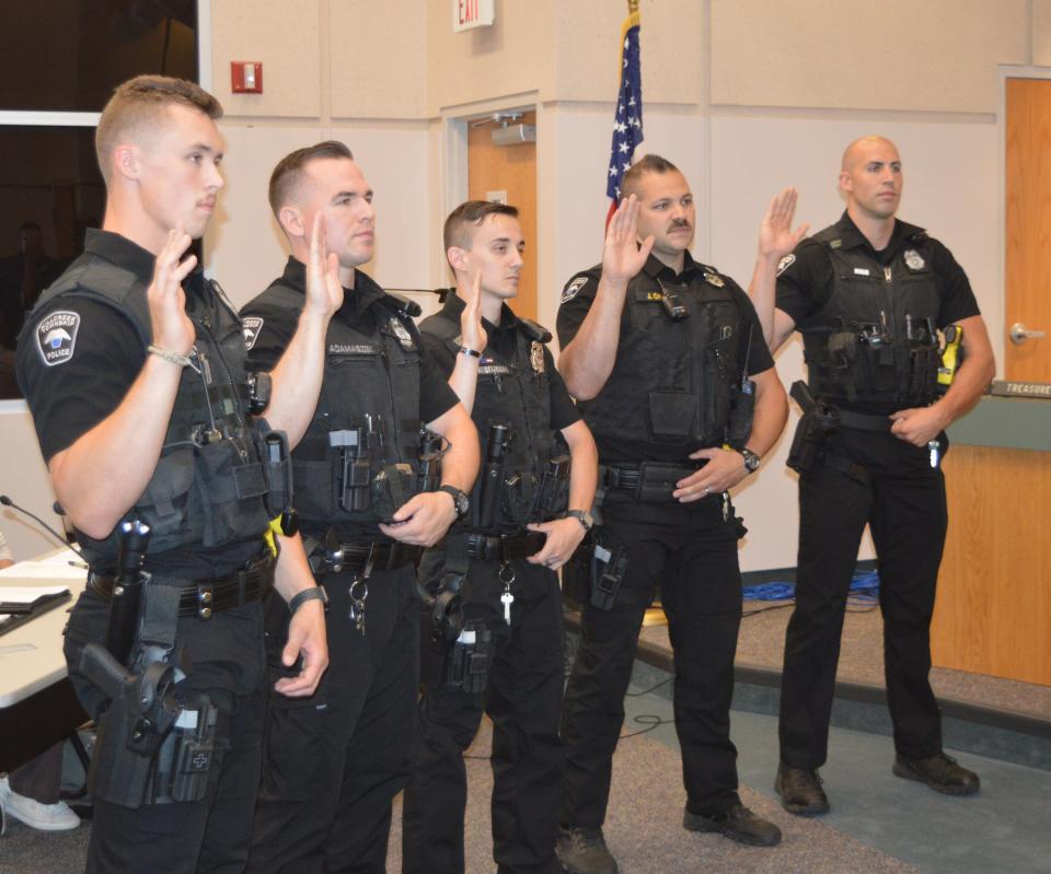 Millcreek Township officials in July swore in, from left, Alec Colosimo, Ryan Adamaszek, Nathan Regelmann, James Chest and Kyle Maio as new officers on the township police department. The township has hired three additional officers, boosting its complement to 64, months after members of the township police union raised concerns about manpower levels and staffing issues.