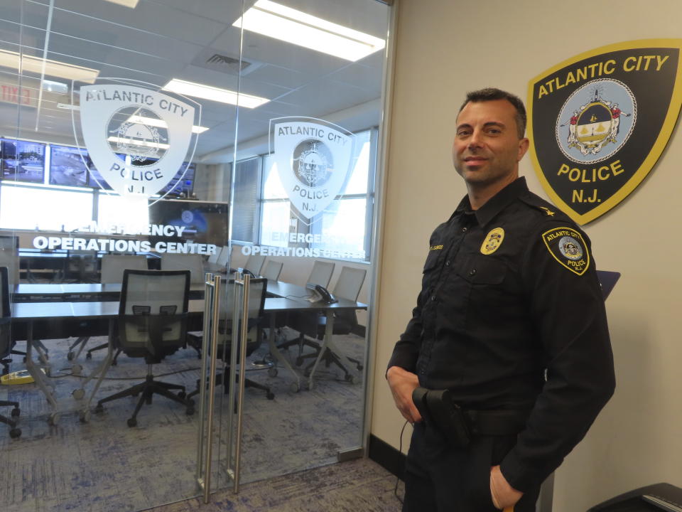 Police Chief James Sarkos, of Atlantic City, N.J., prepares to enter his department's video surveillance center on Nov. 16, 2023. The city plans to add hundreds of additional security cameras to the 3,000 that already keep an electronic eye on the seaside gambling resort. (AP Photo/Wayne Parry)