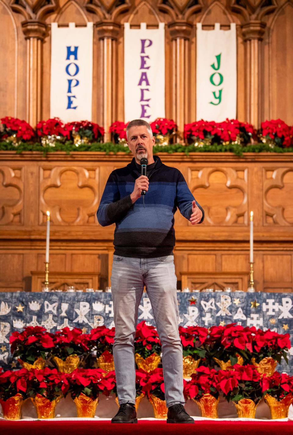 Rev. Forrest Gilmore, executive director at Beacon Inc., speaks at the Homeless Memorial Vigil held by Beacon Inc. at First Christian Church on Wednesday, Dec. 13, 2023.