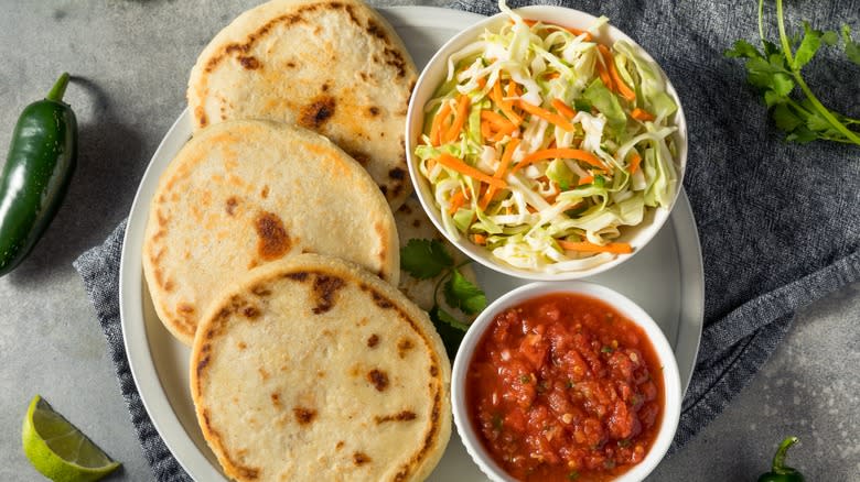 Pupusas with curtido and salsa