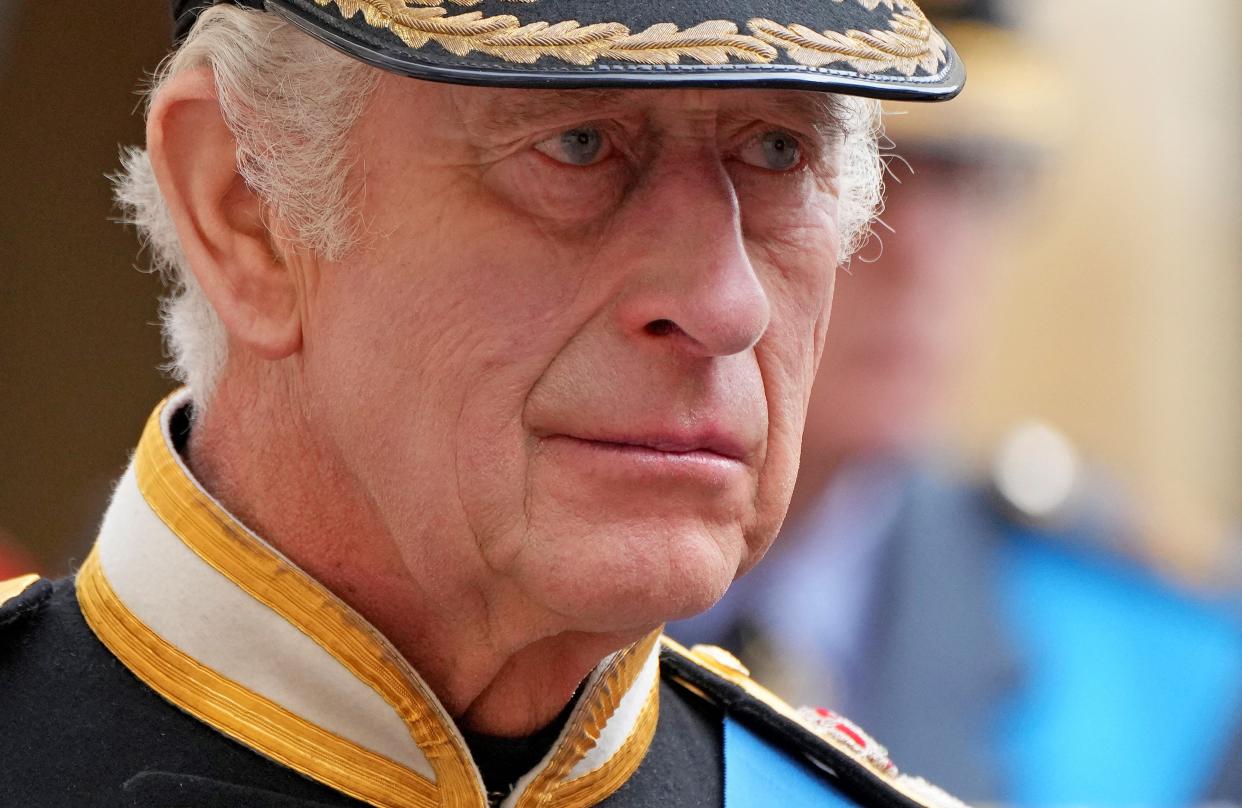 Britain's King Carlos III follows the coffin of Queen Elizabeth II, aboard the State Hearse, as it travels inside Windsor Castle on September 19, 2022, ahead of the Committal Service for the late Queen. (Photo by Jon Super / POOL / AFP) (Photo by JON SUPER/POOL/AFP via Getty Images)