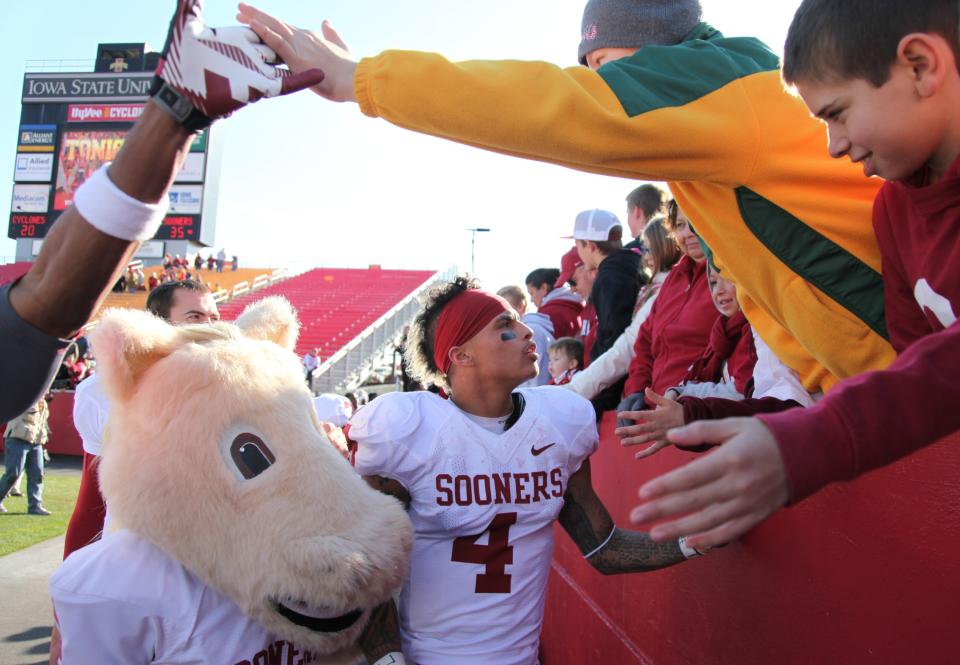 Wide receiver Kenny Stills #4 of the Oklahoma Sooners celebrates with fans after the match-up against the Iowa State Cyclones on November 3, 2012 at Jack Trice Stadium in Ames, Iowa. Oklahoma lead Iowa State 27-20 at the half. (Photo by Matthew Holst/Getty Images)