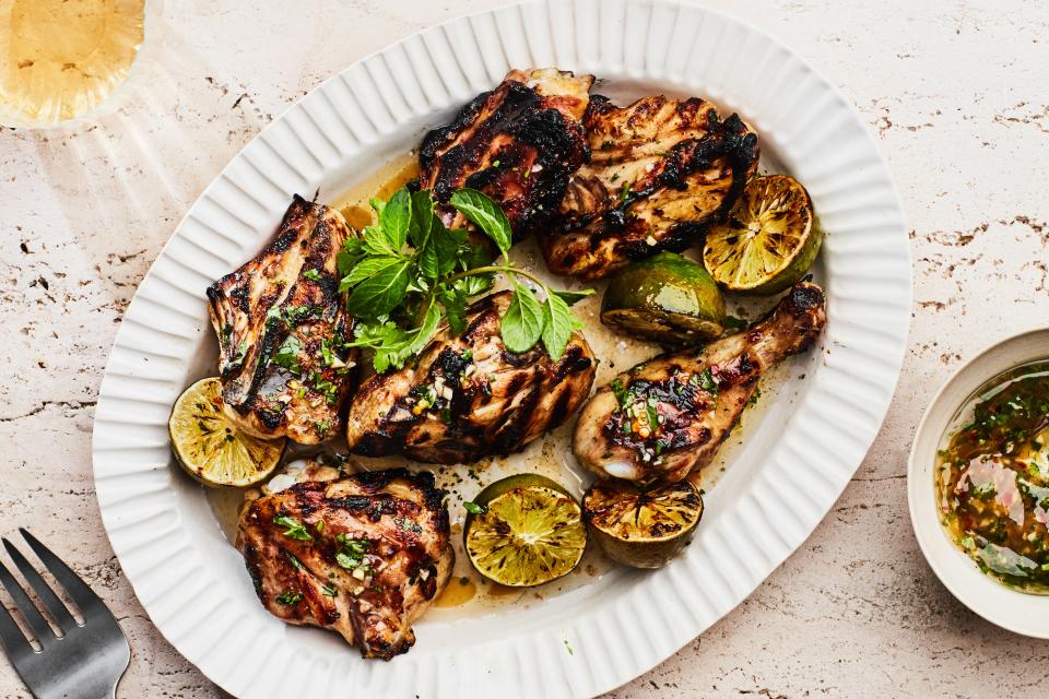 Just looking for grilled chicken recipes that are truly no-fail? This is the one you need. For the very best results, we brine the chicken before it goes on the grill; sear it over the flames; finish cooking it on the other side of the grill; then toss it in a robust vinaigrette when it's done. Wrap up the meal with wedges of watermelon to achieve summer bliss. <a href="https://www.epicurious.com/recipes/food/views/foolproof-grilled-chicken-108166?mbid=synd_yahoo_rss" rel="nofollow noopener" target="_blank" data-ylk="slk:See recipe.;elm:context_link;itc:0" class="link ">See recipe.</a>
