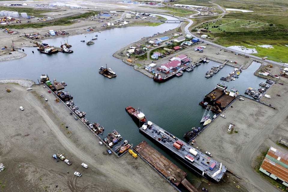 This photo provided by the City of Nome shows the inner harbor of the Port of Nome, Alaska, on Aug. 11, 2017, where goods at that arrive at the port are then prepared for shipment to villages throughout the region. Shipping lanes that were once clogged with ice for much of the year along Alaska's western and northern coasts have relented thanks to global warming, and the nation's first deep water Arctic port should be operational in Nome by the end of the decade. (Nome Harbormaster Lucas Stotts/City of Nome via AP)