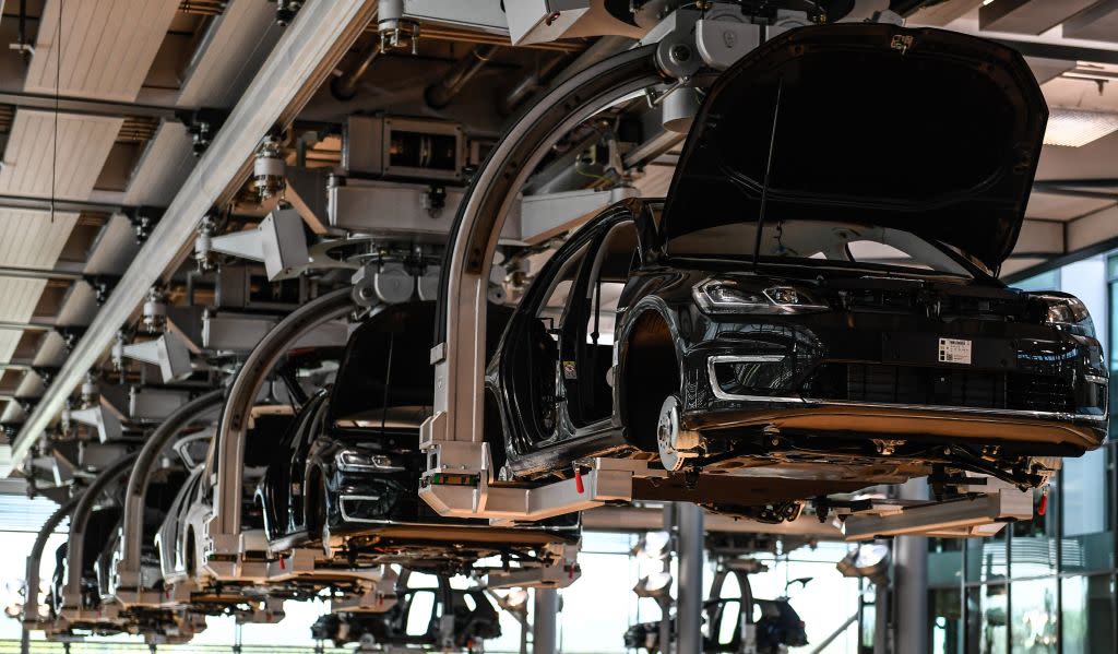 A view of the e-Golf production line at the so-called 'Glaeserne Manufaktur' ('Transparent Factory') in Dresden, Germany, 25 April 2017. In April 2017 the German car automaker VW started a new production line of battery-powered electric cars. According to the company, the Dresden Transparent Factory produces about 25 Volkswagen e-Golf per day